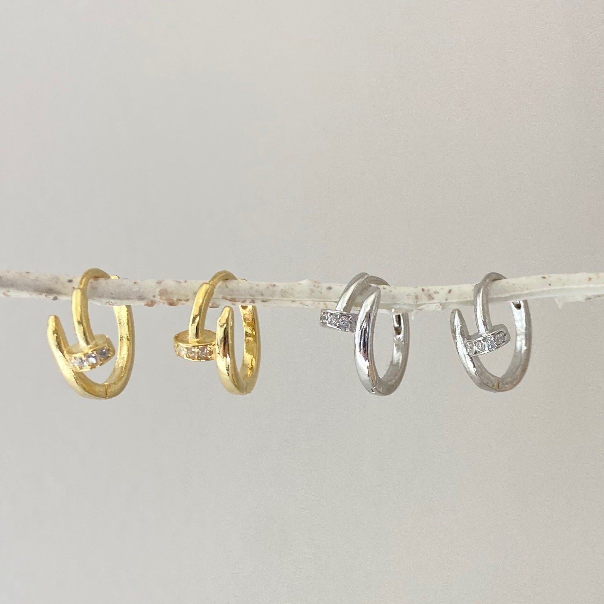 Nail cheap head earrings